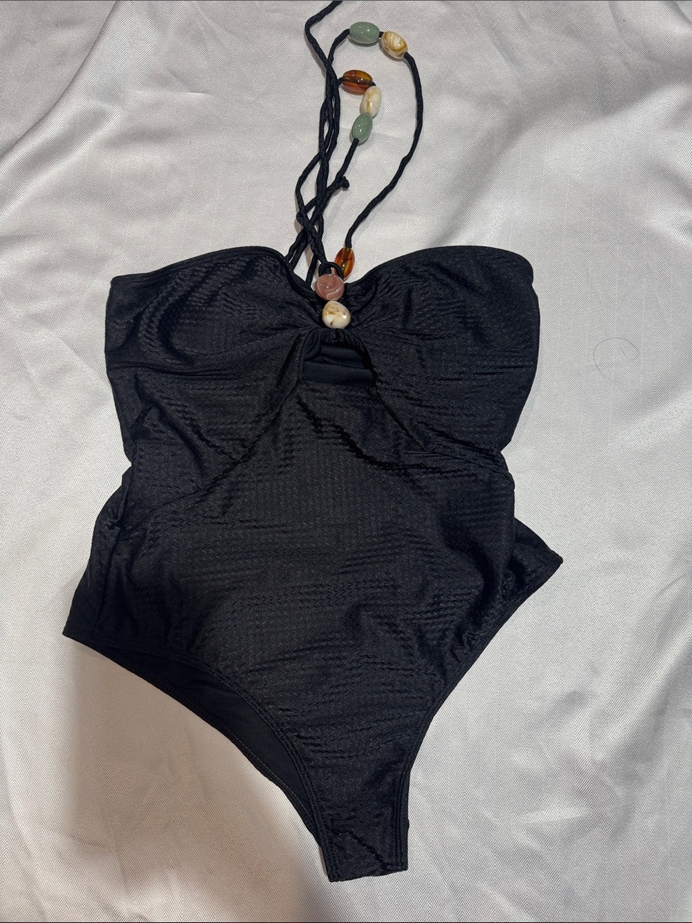 Strapless Black One-Piece Bodysuit with Beaded Halter Detail